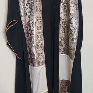 Chic Black and Gold Maxi Dress with Intricate Patterns